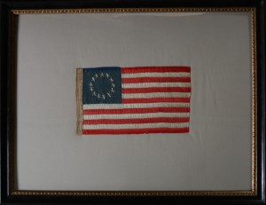 Pressure mount of a historic 13-star flag, using the owners frame.
