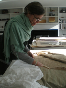 Historic textiles and fabric wall coverings are examined and treated by Gwen Spicer, textile conservator