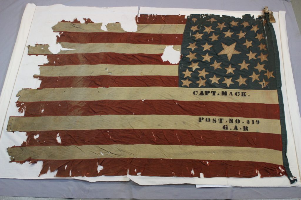 Civil war flag before conservation by textile conservator and flag expert Gwen Spicer