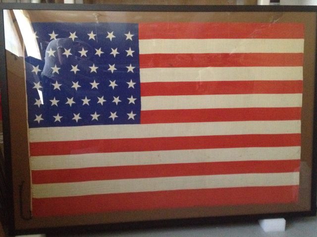 Historic and antique flag repair and restoration, conservation by professional textile conservator, conservation studio specializing in flags and banners and historic textiles